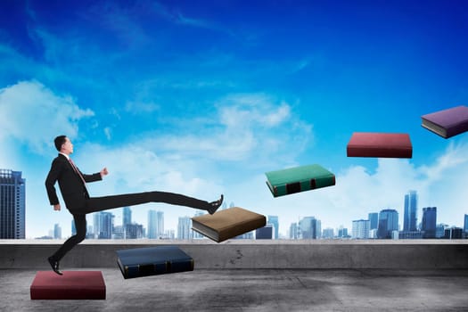 Business person step up flying book that look like stair. Career and education concept