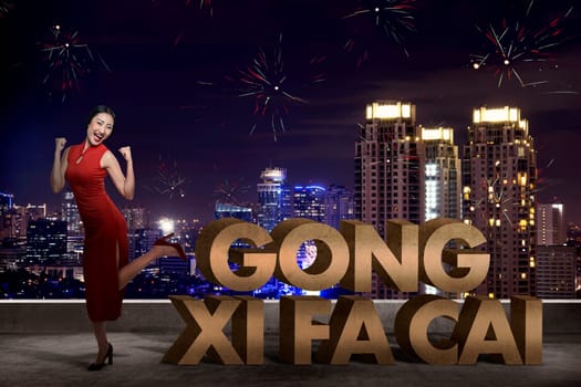 Chinese woman in cheongsam dress smile. Happy chinese new year concept