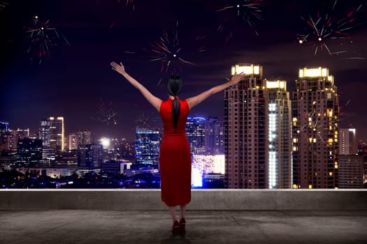 Back view of woman looking the city celebrate chinese new year
