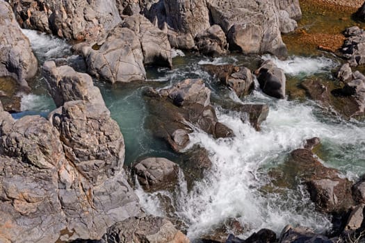 Roaring Cascades among Granite Boulders on the East Fork Black River in Johnsons Shut-ins State Park in Missouri