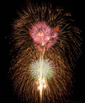 Colorful fireworks on night sky background