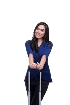 Beautiful asian woman holding suitcase isolated over white background