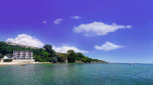 Clear morning scene of a hotel on the seashore. Panoramic view of the coast of Black Sea, Balchik city, Bulgaria