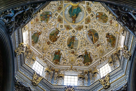 PUEBLA, MEXICO - MARCH 2: Impressive colonial architecture on the roof inside of catholic church in Puebla, Mexico on March 2, 2017