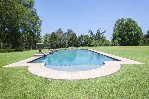 Summer swimming pool home landscape