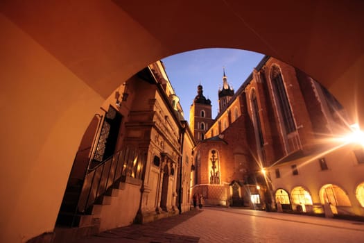 Rynek Glowny Square with St. Mary's Church in the old town of Krakow in southern Poland.