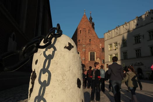 Rynek Glowny Square with St. Mary's Church in the old town of Krakow in southern Poland.