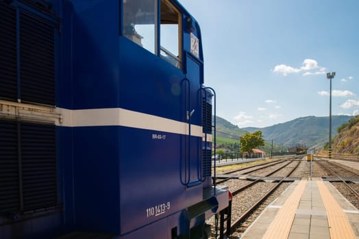 TUA, PORTUGAL - JULY 08, 2017: Historic train on Tua's Train Station. The train runs between June and October along the bank of the river Douro.