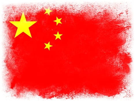 Powder paint exploding in colors of China flag isolated on white background. Abstract particles explosion of colorful dust.