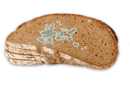 Mouldy bread exposed on a white background