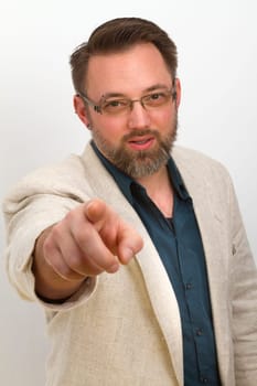 Man gesticulates with hand and shows fingers with a bright background