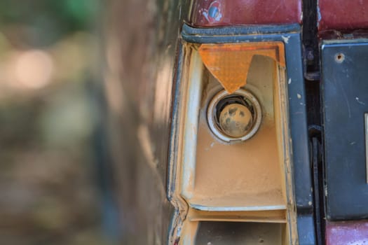 Detail of a broken brake light, trashed crashed accident car