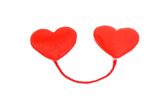 Two red hearts in love on white background