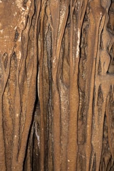 Crystal Cave Kanchanaburi orange color geological pointed stalactite