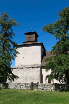 The Church in Vamlingbo, Gotland, Sweden with a clear blue sky.