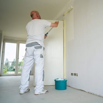 Painter during the renovation of an apartment