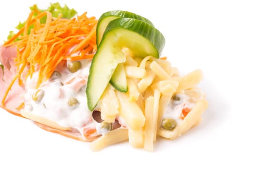 Danish specialties and national dishes, high-quality open sandwich. Sandwich with sliced ham, Mayonnaise with green peas and carrot tart, cracked carrots, asparagus and cucumbers