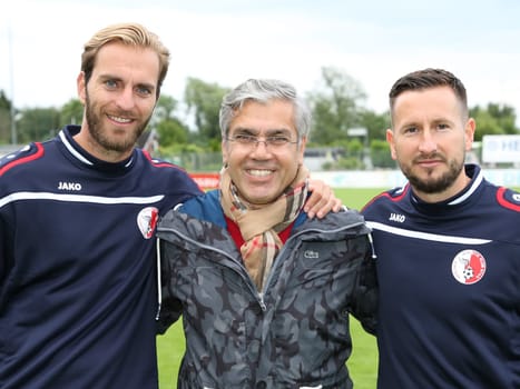 Assistant coach Ronny Emmel,sporting director Mehmet Öztürk and head coach Markus Zschiesche (all Berliner AK) at the test match Hallescher FC against Berliner AK on 30.06.2017 in Dessau