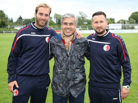 Assistant coach Ronny Emmel,sporting director Mehmet Öztürk and head coach Markus Zschiesche (all Berliner AK) at the test match Hallescher FC against Berliner AK on 30.06.2017 in Dessau