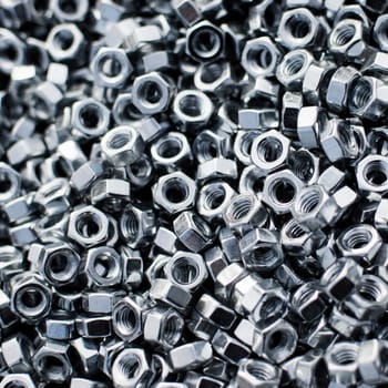 Silver screw nuts are as texture background.