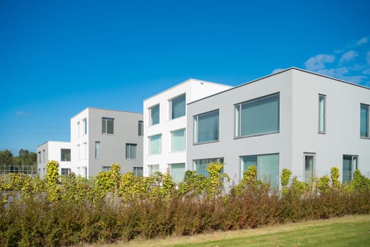 modern white apartment blocks in the netherlands