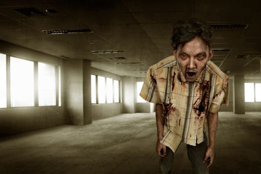 Angry asian zombie man in clothes on the old room