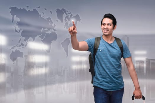 Portrait of asian tourist with suitcase going to traveling. Travel concept