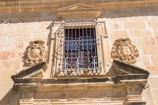 Window in San Felipe Neri Old council seminar, Baeza, Jaen, Spain