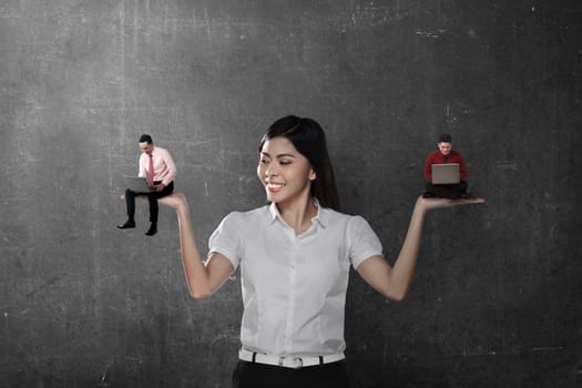 Asian business woman choose two man working. Work promotion concept