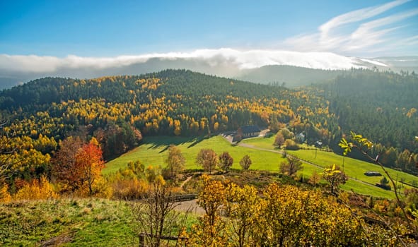 View from the rock of Dabo to the autumnal forests of the Vosges