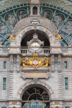 ANTWERP, BELGIUM - OCTOBER 2, 2016: Baroque interior of the central station with a gold decorated clock