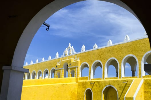 View of the entrance with arches of the monastery in Izamal, Mexico