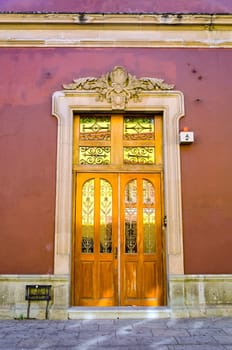 Beautiful facade of a colonial house in street in Oaxaca,Mexico