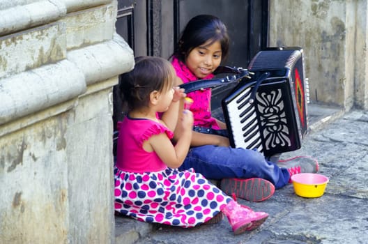 OAXACA, MEXICO - MARCH 4: Young girls in the street in Oaxaca, Mexico on March 4, 2017