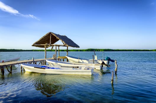Boats on the waterfront in Rio Lagartos in the Yucatan Peninsula in Mexico
