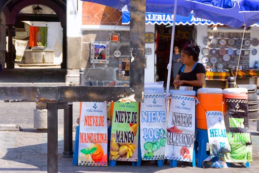 PUEBLA, MEXICO - MARCH 2: Woman Selling Juice on the Street in Puebla, Mexico on March 2, 2017