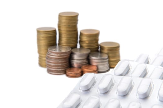 coin stack growing business with drug, Saving money concept