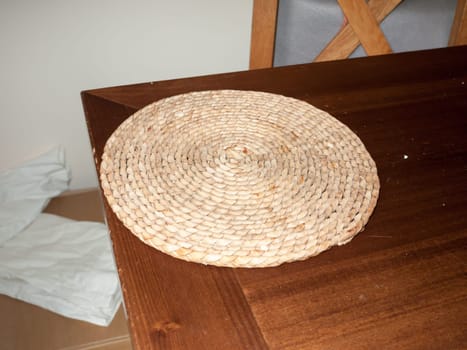 a circle spiral straw table top mat  England  UK