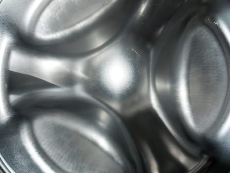 close up of metal inside a washing machine  England  UK