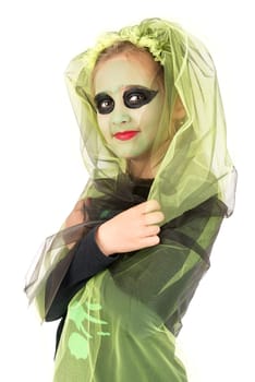 Girl with face-paint and Halloween witch costume over a white background