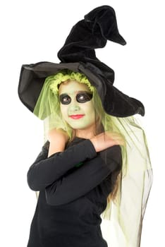 Girl with face-paint and Halloween witch costume over a white background