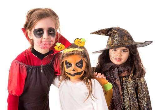 Group of kids with face-paint and Halloween costumes