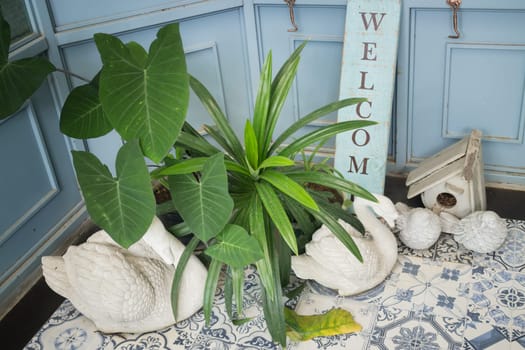 Welcome corner in front of house, stock photo