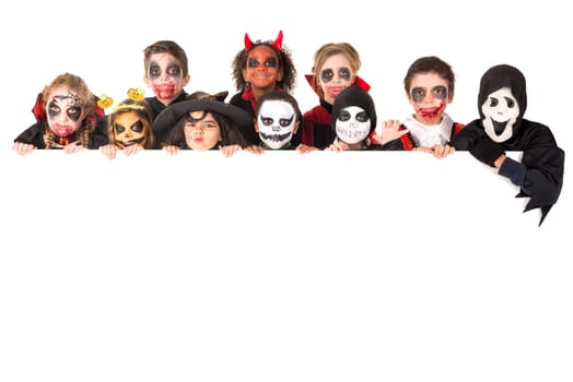 Group of kids with face-paint and Halloween costumes