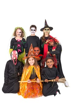 Kids with face-paint and Halloween costumes isolated in white