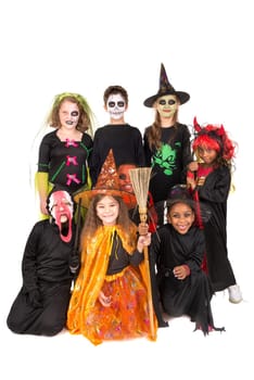 Kids with face-paint and Halloween costumes isolated in white