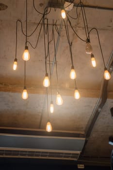 Antique light bulbs hanging on the ceiling, stock photo