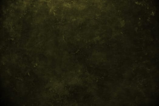 close up on dark yellow wall background or texture