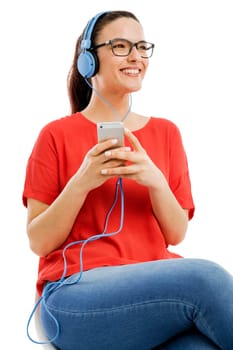 Happy woman listen music on her phone, isolated over white background