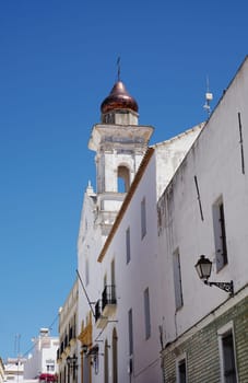 House front with church tower